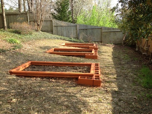 And here aesthetics came into play. I could not abide mismatched retaining walls and bed frames, so I spray painted them.